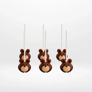 Bear cake pops with cute edible details handcrafted at a cake shop in Bearwood.