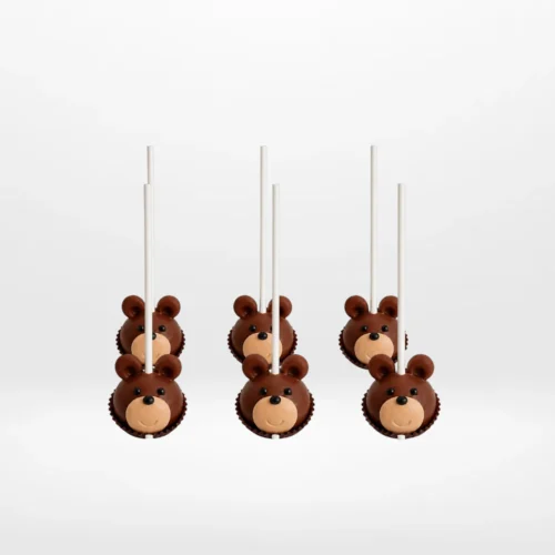 Bear cake pops with cute edible details handcrafted at a cake shop in Bearwood.