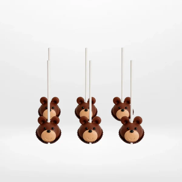 Bear cake pops with cute edible details handcrafted at a cake shop in Bearwood.