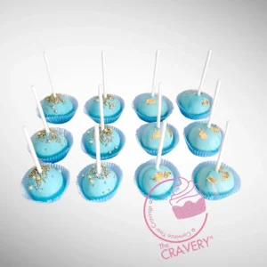 Blue cakepops with elegant decorative finishes handcrafted at a cake shop in Bearwood.