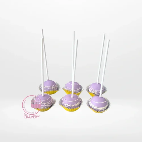 Handcrafted cake pop with chocolate coating and decorative sprinkles from a cake shop on Smethwick High Street.