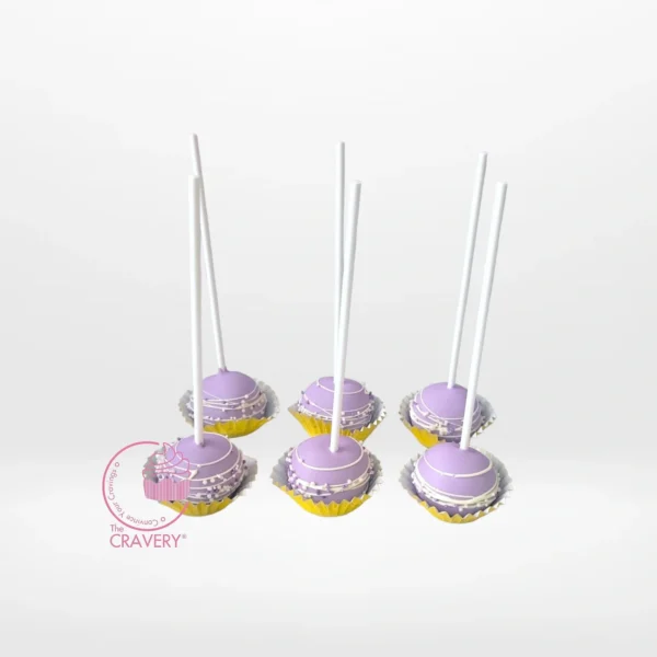 Handcrafted cake pop with chocolate coating and decorative sprinkles from a cake shop on Smethwick High Street.