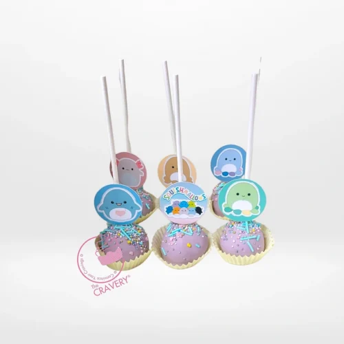 Squishmallows themed cake pop cake with colourful character cake pops for birthday celebrations in Birmingham.