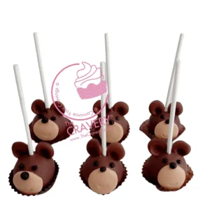 Bear themed cake pops with cute edible details handcrafted at a cake shop in Bearwood.