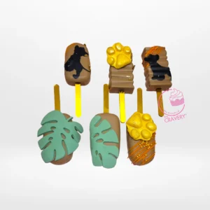 Lion King themed cakesicles handmade at a cake shop in Birmingham.