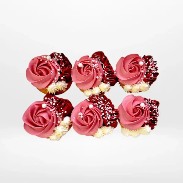 Rose cupcake with delicately piped buttercream petals, handcrafted for Birmingham cupcakes customers.