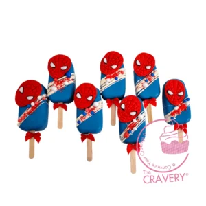 Mini Spiderman-themed cakesicles decorated with superhero details.