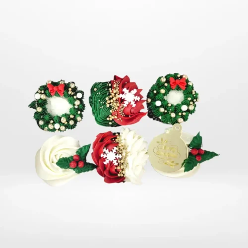 Festive XMAS cupcakes with seasonal buttercream and edible decorations crafted by cake makers in Birmingham.