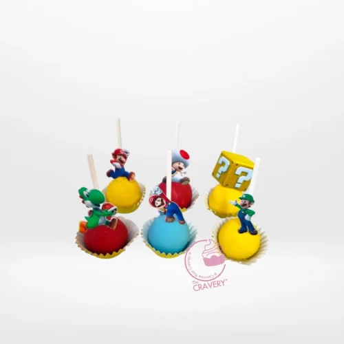 Mario themed cake pop with handcrafted character details from a bakery in Sutton Coldfield.