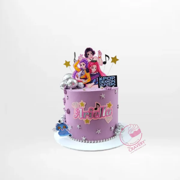 K Pop Demon Hunter themed cake with bold colours and custom decorations from a cake shop in Birmingham.