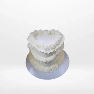 Small heart-shaped birthday cake with buttercream decoration in Birmingham.