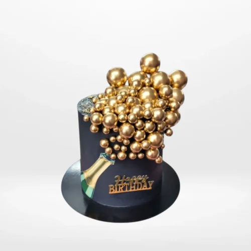 Champagne cake with gold accents and elegant decoration made in Birmingham.