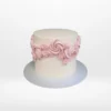 Custom celebration cake with smooth buttercream finish made in Birmingham.