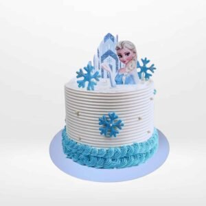Frozen themed cake with icy blue tones and smooth buttercream finish handcrafted in Birmingham.