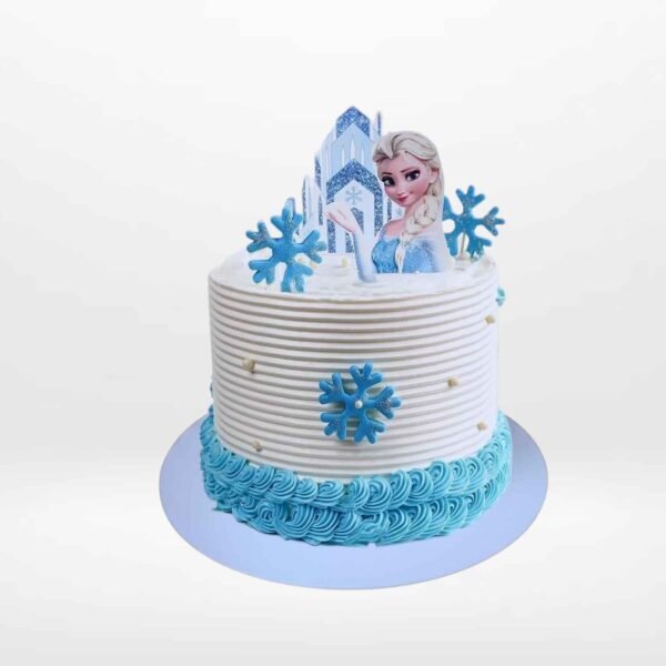 Frozen themed cake with icy blue tones and smooth buttercream finish handcrafted in Birmingham.