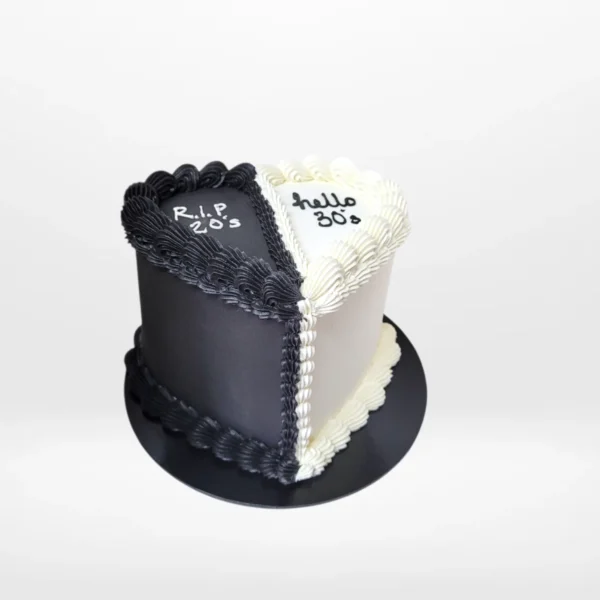 Half and half cake with split design and smooth buttercream finish handcrafted in Birmingham.