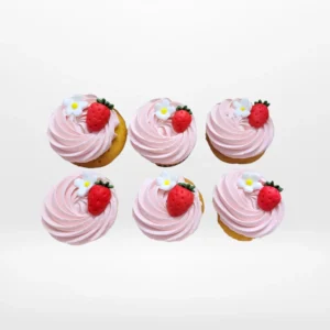 Strawberry cupcakes with smooth buttercream and decorative topping made in Birmingham.