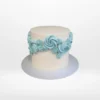 Cute cake with pastel colours and decorative buttercream made in Birmingham.
