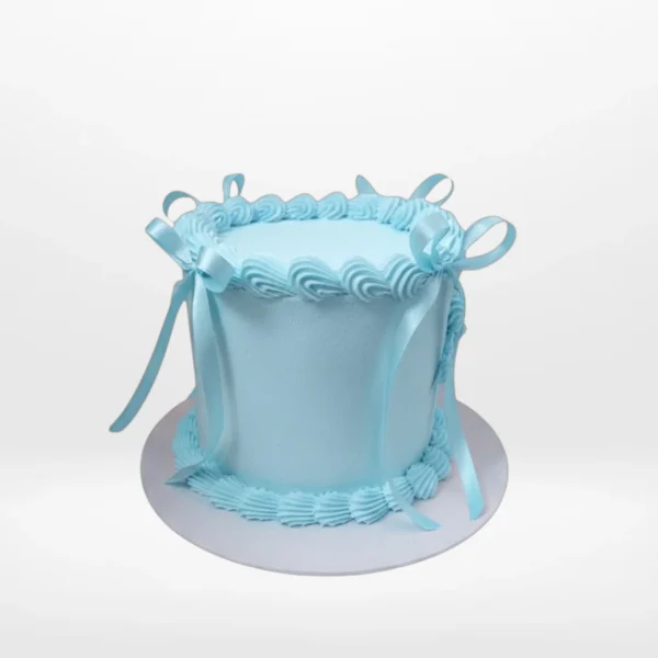 Custom celebration cake with smooth buttercream finish made in Birmingham.