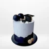 Black and gold graduation cake with elegant decorations from Cake Shop Solihull.