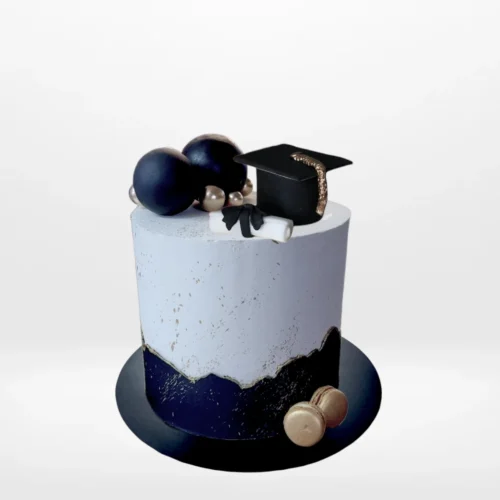Black and gold graduation cake with elegant decorations from Cake Shop Solihull.