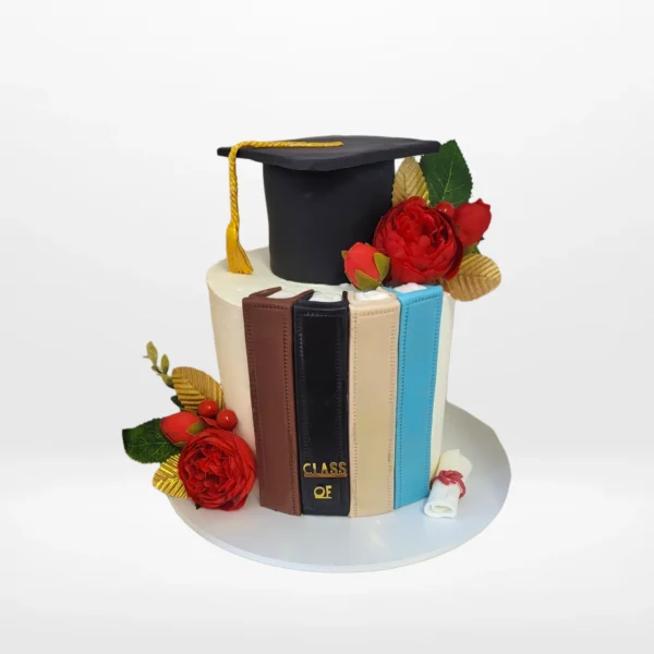 Graduation cake with handcrafted edible sugarpaste books from Cake Shop Dudley.