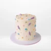 Spring cake with pastel flowers and butterfly decorations from Cake Shop Birmingham.