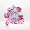 First birthday cake topper with layered 3D shaker design and sweet-themed decorations from Cake Shop Birmingham.