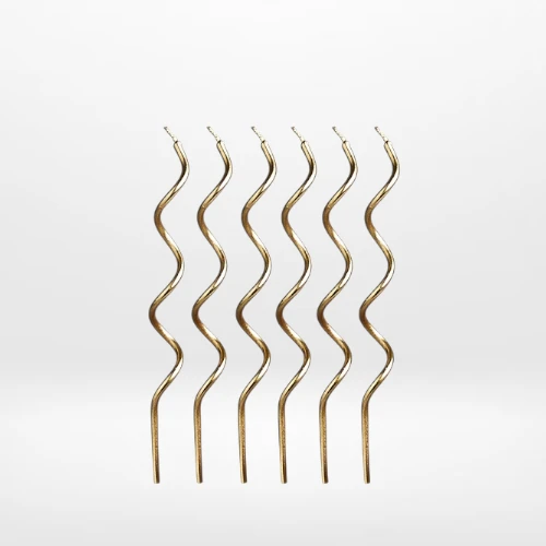 Gold curly candles for celebration cakes from Cake Shop Birmingham.