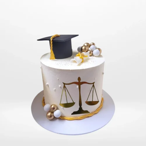 Law graduation cake with books and scales of justice from Cake Shop Walsall.