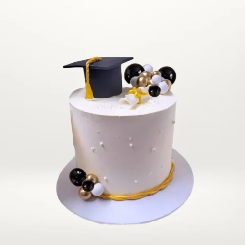 Graduation cap cake with elegant personalised decorations from Cake Shop Birmingham.