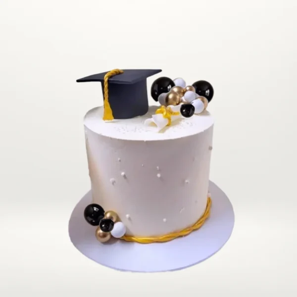 Graduation cap cake with elegant personalised decorations from Cake Shop Birmingham.