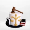 Law graduation cake with scales of justice and graduation decorations from Cake Shop Birmingham.