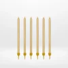 Long gold candles for celebration cakes from Cake Shop Solihull.
