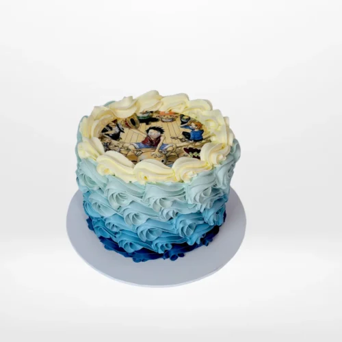 One Piece birthday cake with edible print and buttercream piping from Cake Shop Walsall.