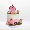 Pink farm cake with non-edible printed farm animal images from Cake Shop Solihull.