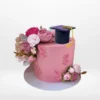 Pink graduation cake with elegant decorations from Cake Shop Walsall.