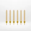 Short gold candles for celebration cakes from Cake Shop Birmingham.