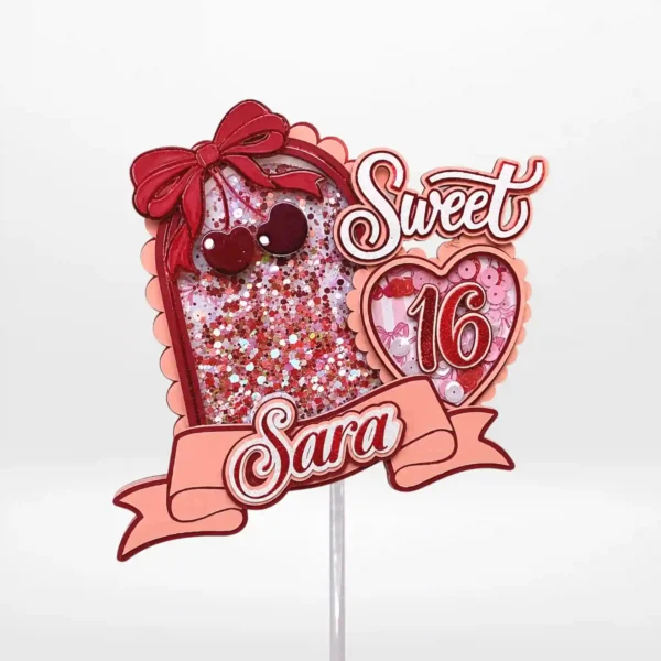 Sweet Sixteen cake topper with layered 3D shaker design, glitter, cherries, and pink decorations from Cake Shop Dudley.