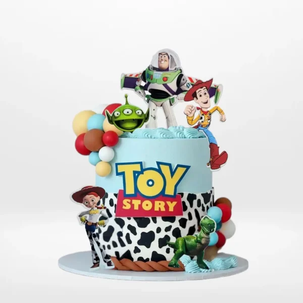 Toy Story Birthday Cake with edible cow print and character prints from Cake Shop Birmingham